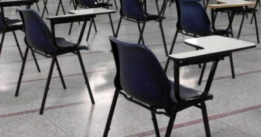 Empty desks in a classroom